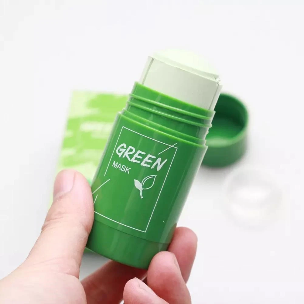 person holding GreenDetox Mask